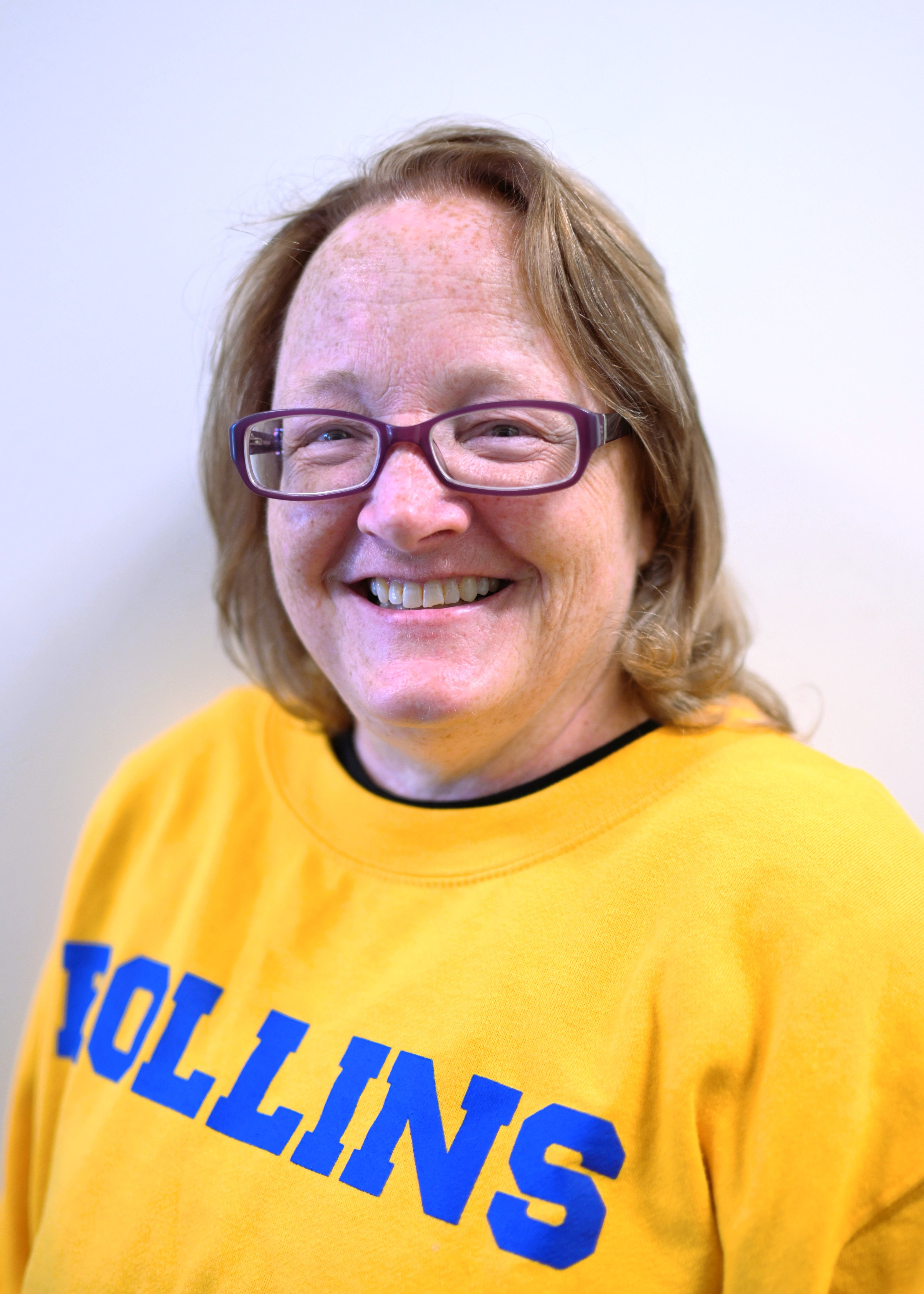 Teacher and child reading a book