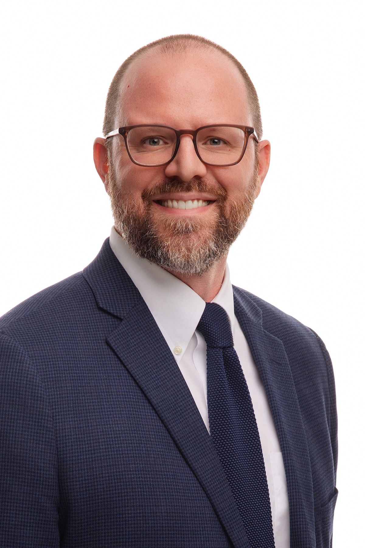 Professional headshot of Dan Myers.