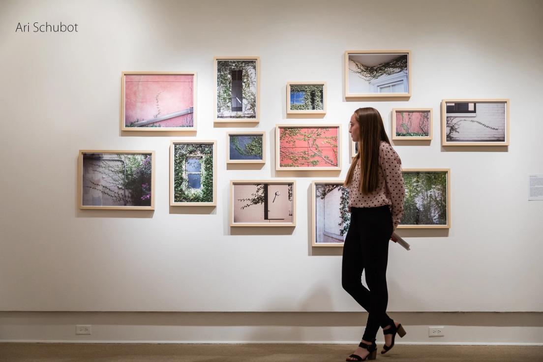 A student showcases her work at Rollins Museum of Art.