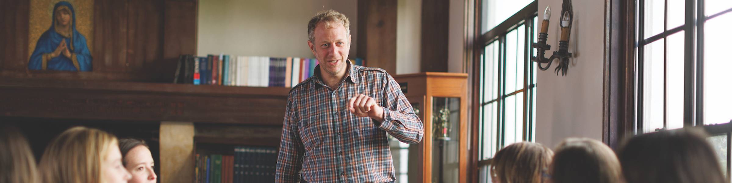 A liberal studies professor leads a class discussion.