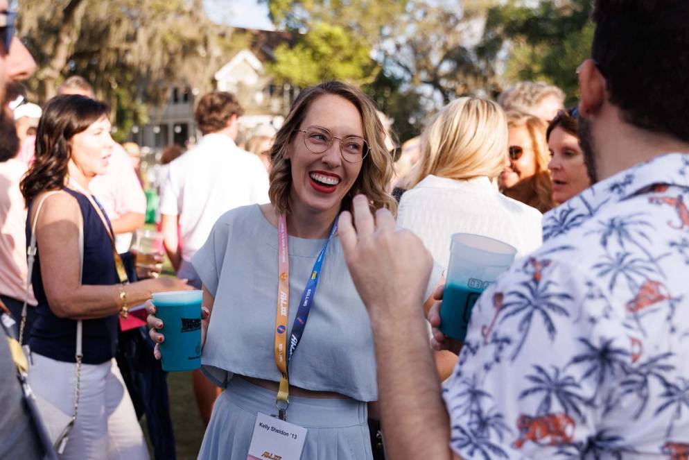 An alumnus socializes at the annual Alumni Weekend event on campus. 