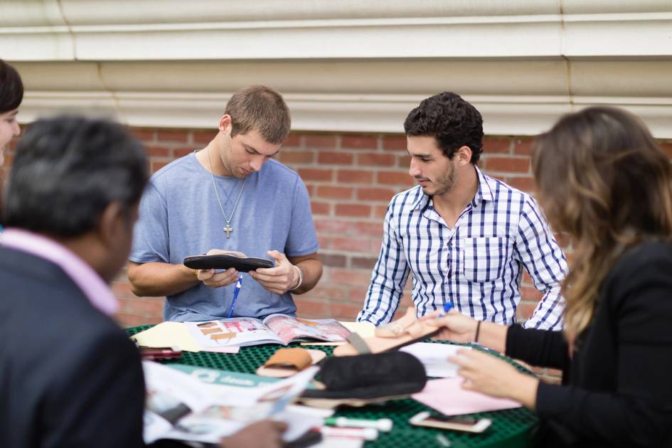 Students work together on a project for a local social enterprise.