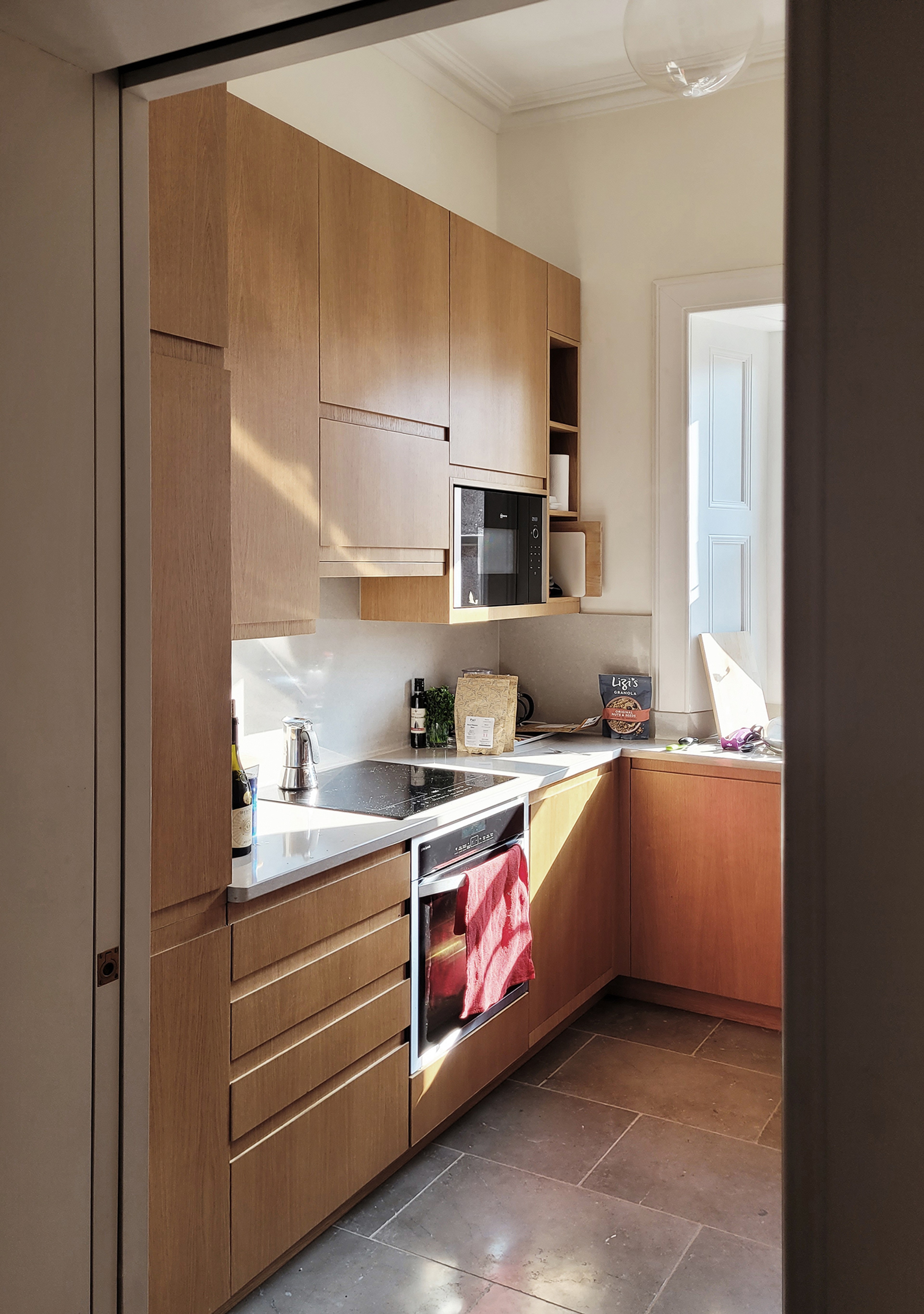 Photograph of sunlight in kitchen.