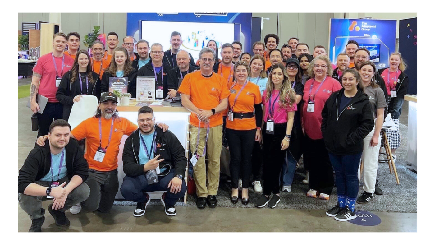 A group photo of The Adaptavist Group team members at an event