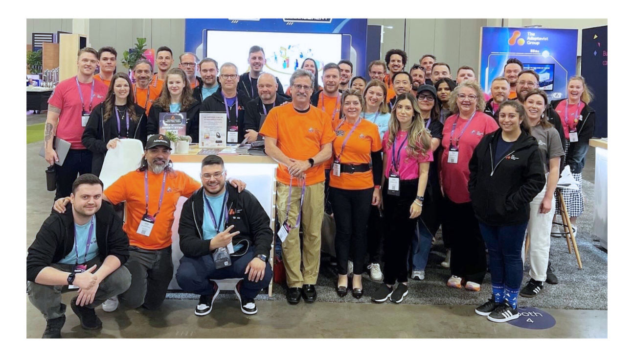 A group photo of The Adaptavist Group team members at an event