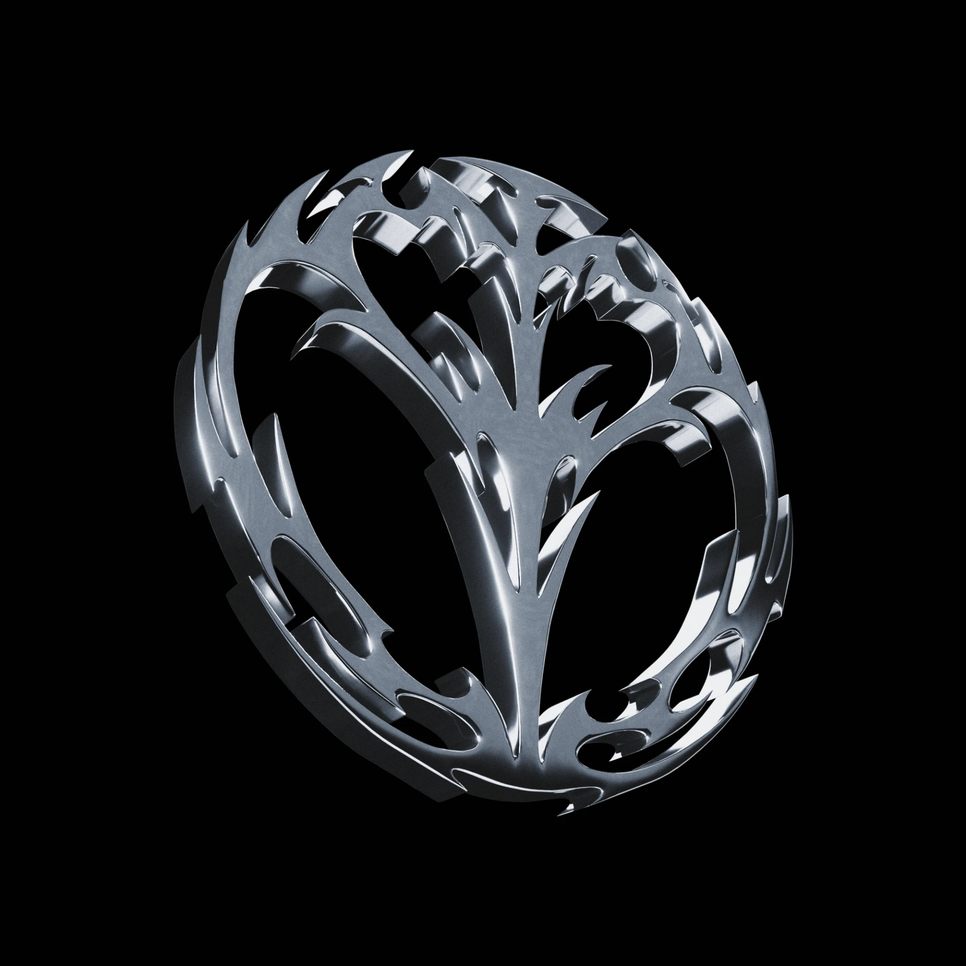 A circular chrome emblem viewed at a slight angle, with branching pointed shapes and curved cutouts against a black background.