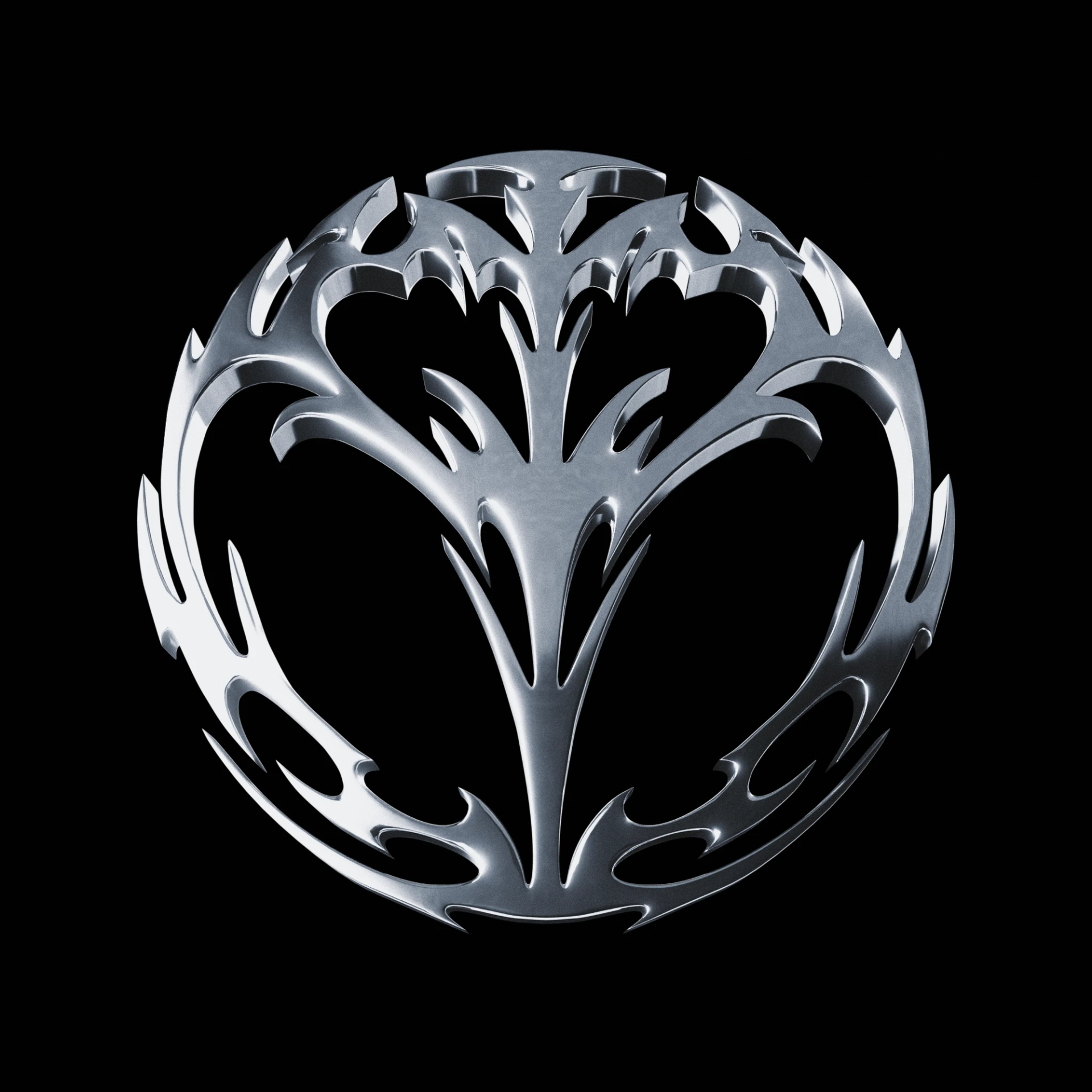 Front view of a circular chrome emblem with symmetrical branching shapes, sharp tips, and reflective beveled edges on a black background.