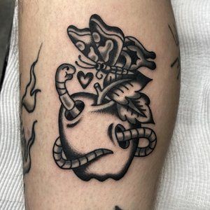 Worm & apple tattoo