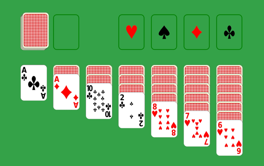 Klondike Solitaire game showing tableau piles, foundation areas, and stock pile with cards