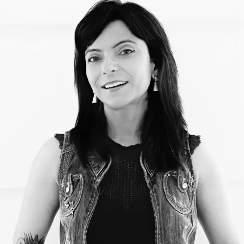 Headshot of Charu Sethi, CMO at Unique Network