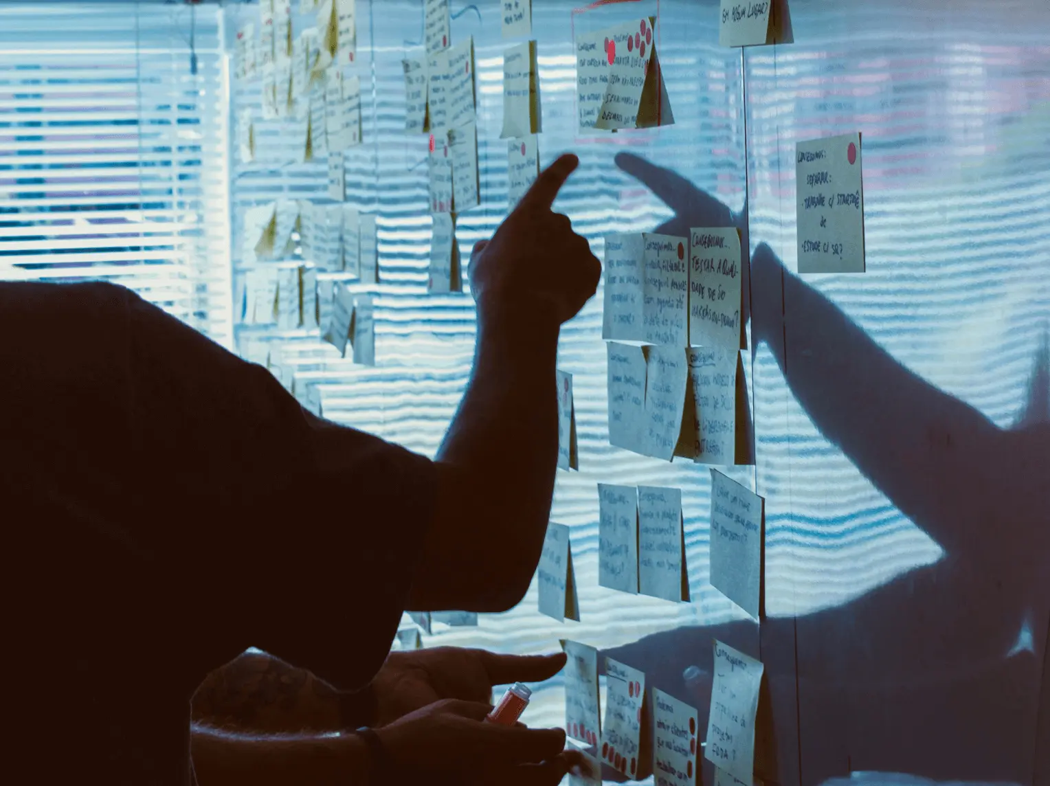 Two people shaking hands symbolizing a deal from a potential grant or funding
