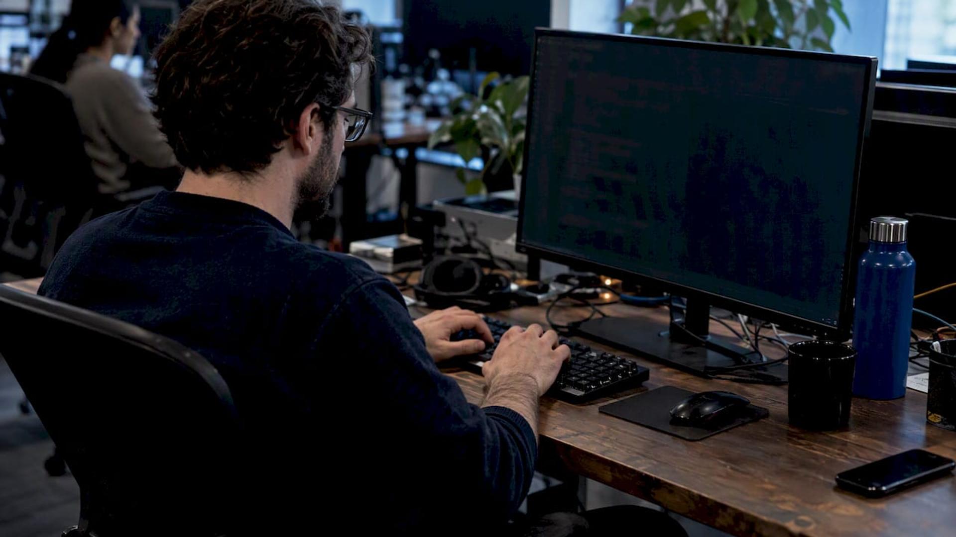 Engineer writing Python functions in code editor