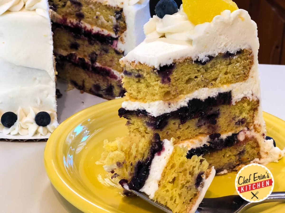 A three-layer lemon blueberry cake with cream cheese icing