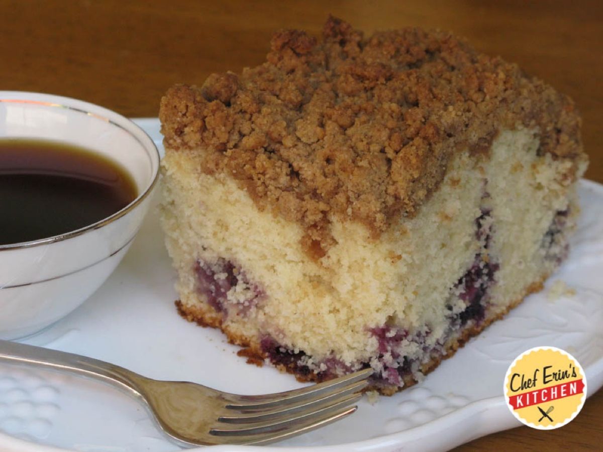 A slice of blueberry crumb cake with cinnamon streusel topping