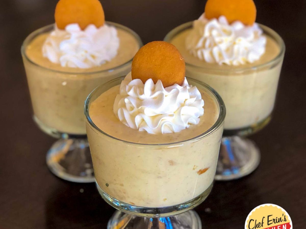 A dish of layered banana pudding with Nilla wafers and whipped topping