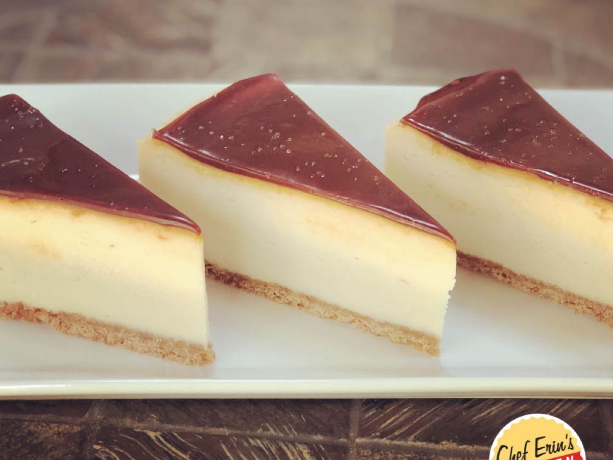 A slice of salted caramel cheesecake drizzled with caramel sauce