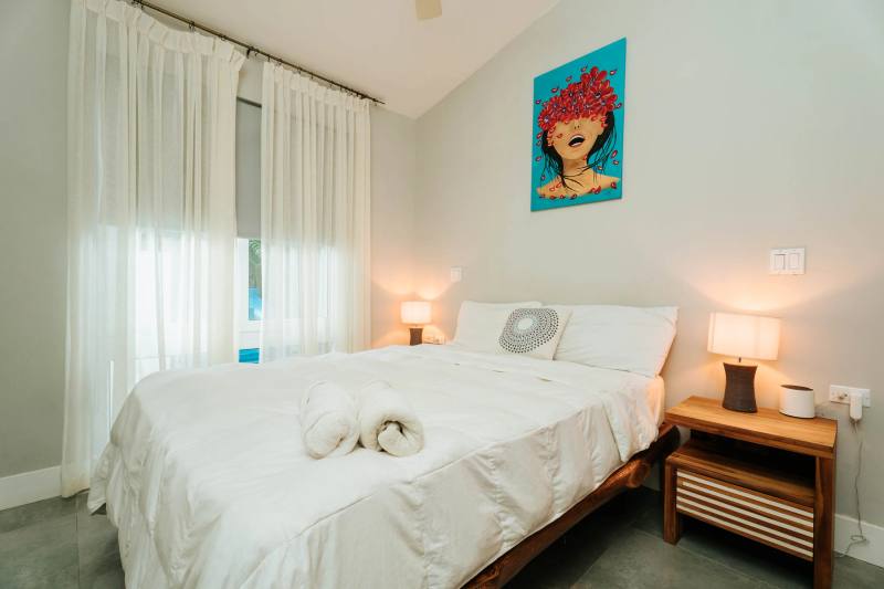 Recámara de Blue Casa Ocean con cama doble