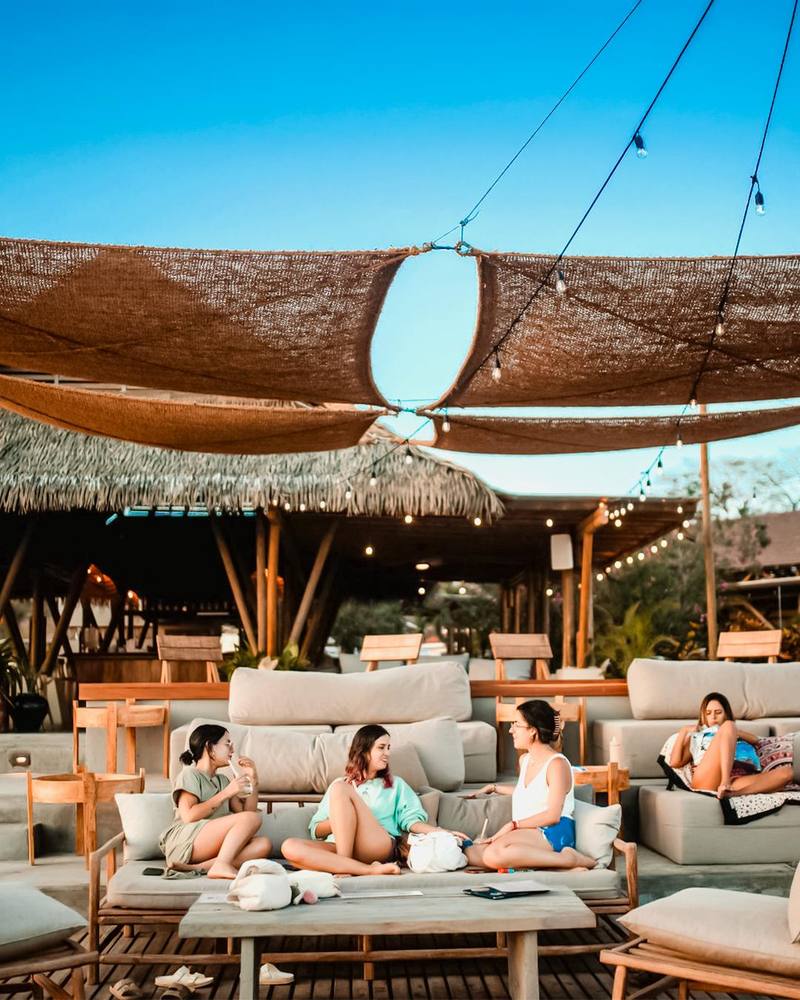 Guests at the Blue Beach Club lounge