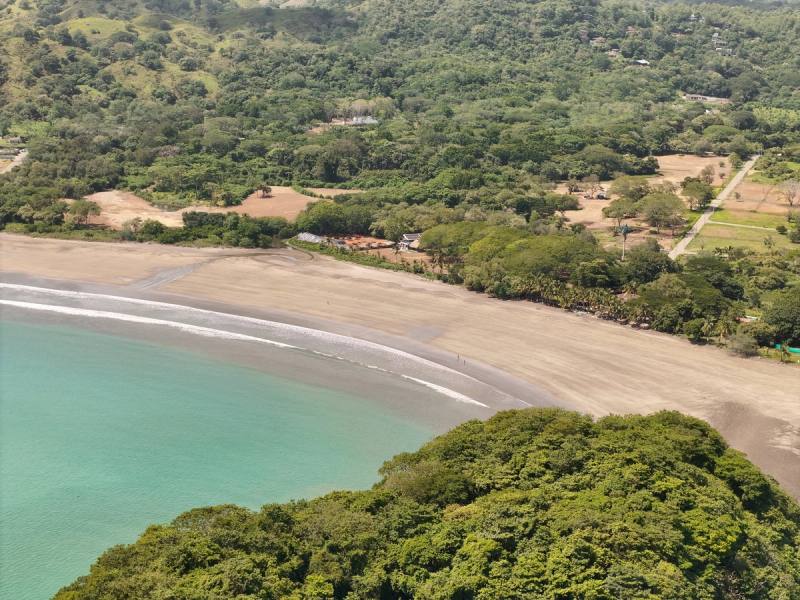 The beach curve below the Villa Marina grounds