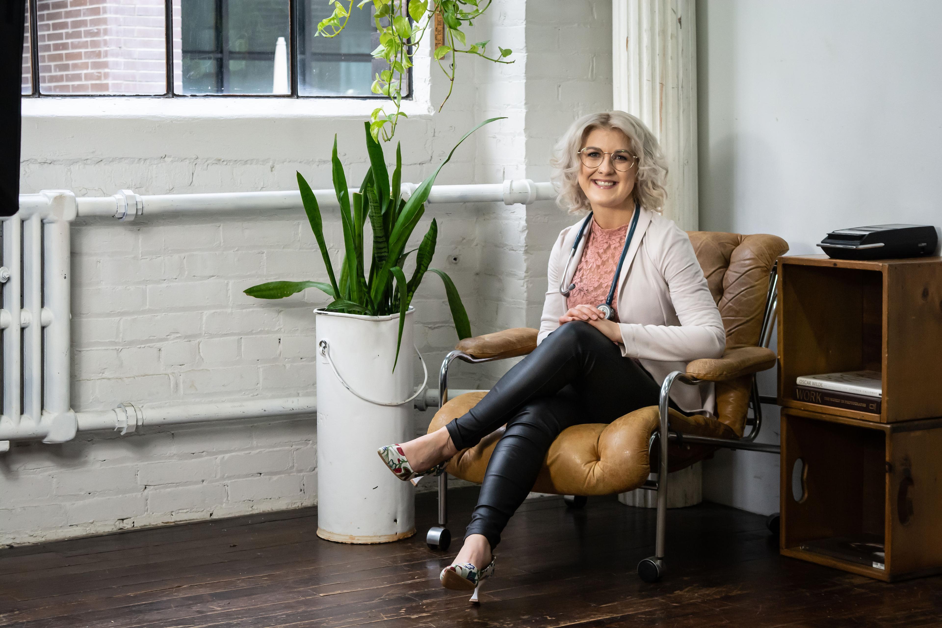 Dr. Alicia writing notes