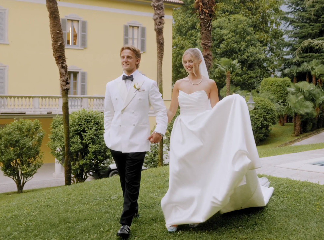 Cinematic wedding film of Rachel and George walking through the gardens of Villa Aura del Lago on Lake Como Italy