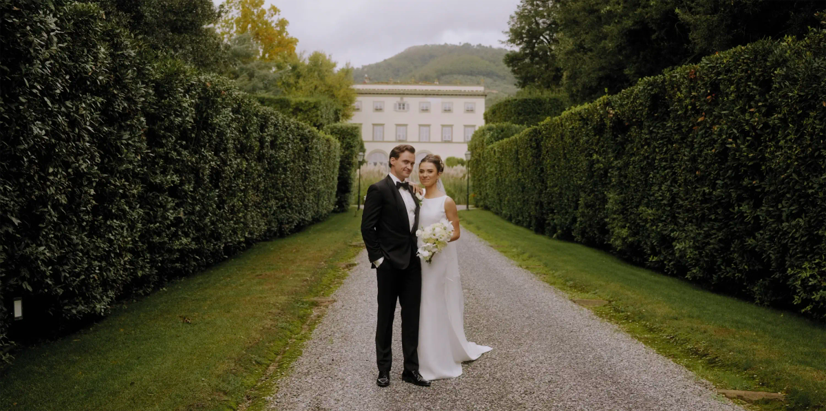Eoghan and Dominyka on the garden avenue of Villa Grabau, Lucca, Italy.
