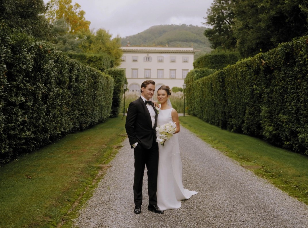 Eoghan and Dominyka on the garden avenue of Villa Grabau, Lucca, Italy.