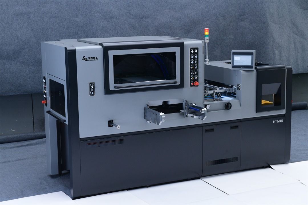 Huatai HUATAI HT-600 YÜKSEK HIZLI OTOMATİK KUTU KESİM MAKİNESİ