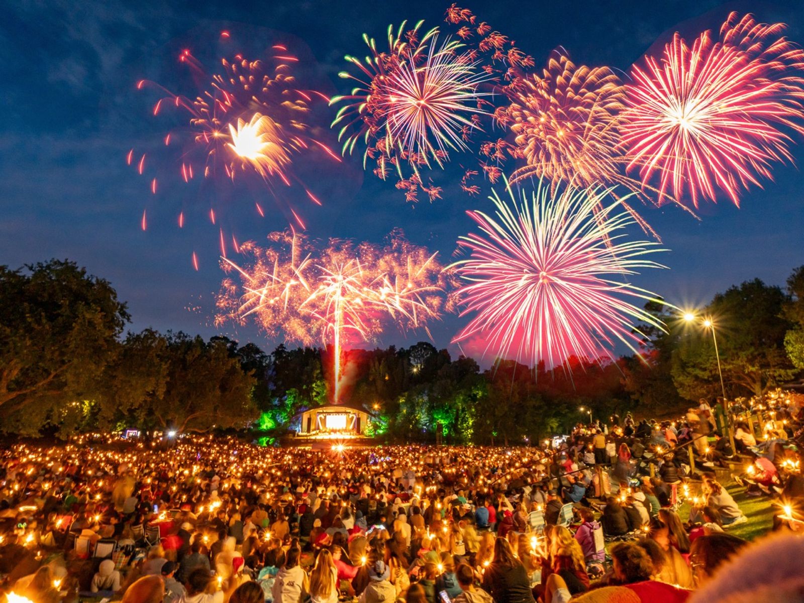 Fireworks over the Bowl of Brooklands stage and candle-lit hillside