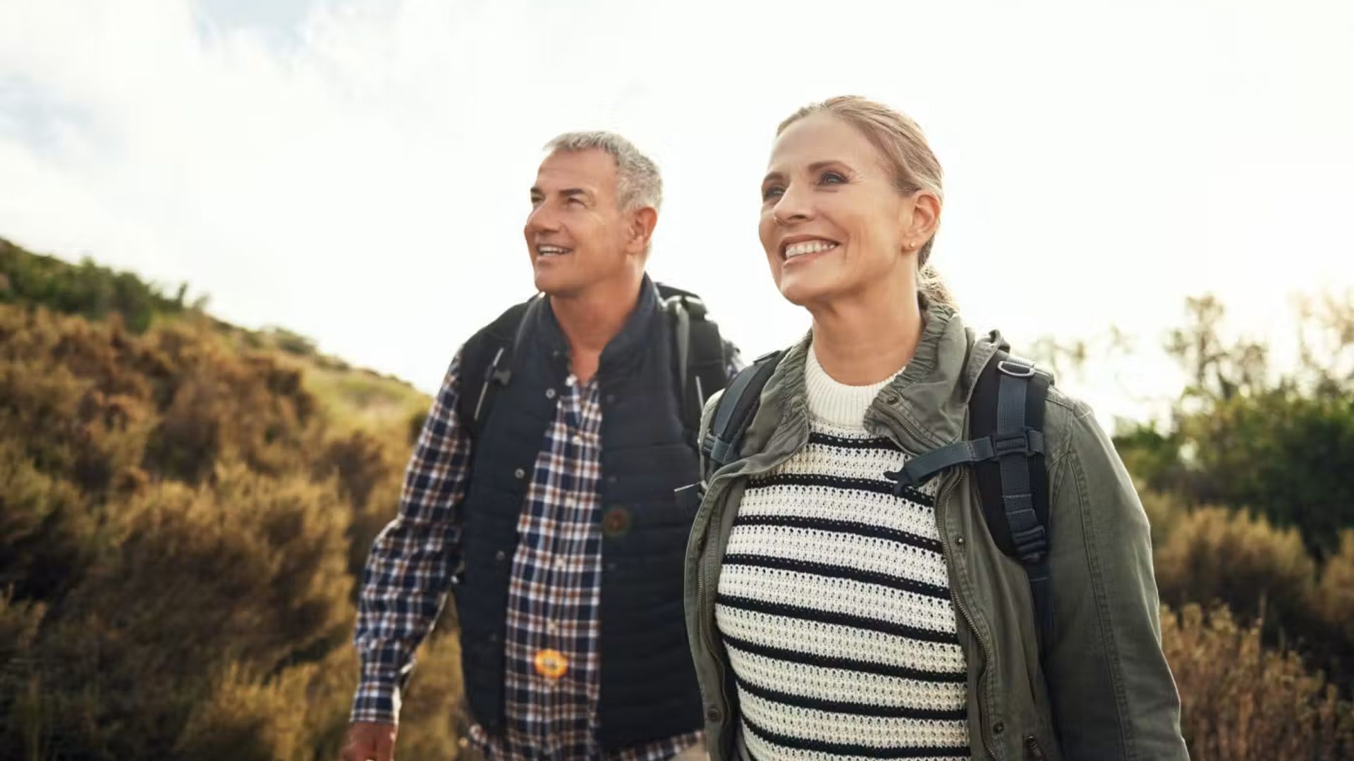 Older Couple Outdoor Walking I Stock 1142166550