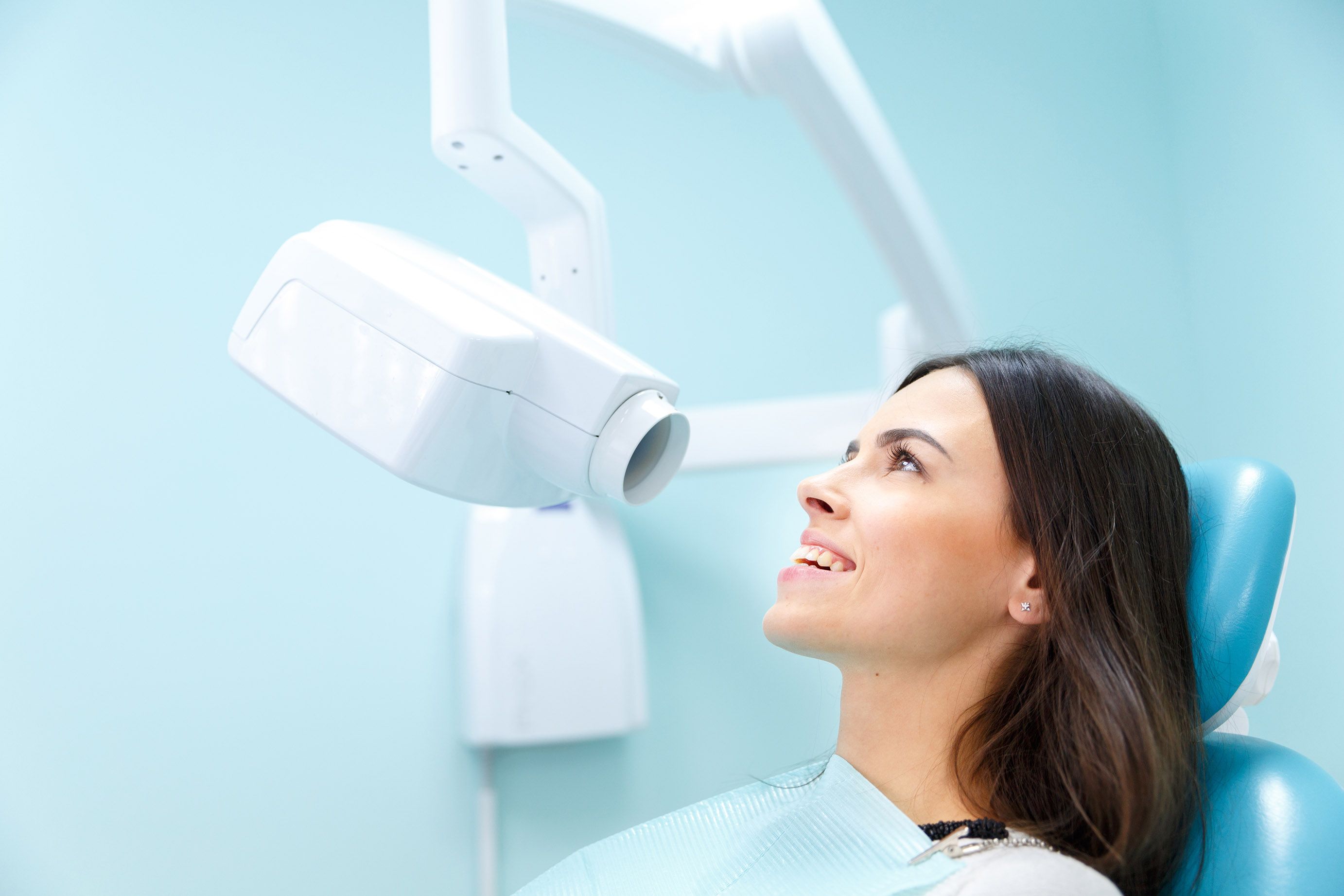 lady having mouth scanned in dentist