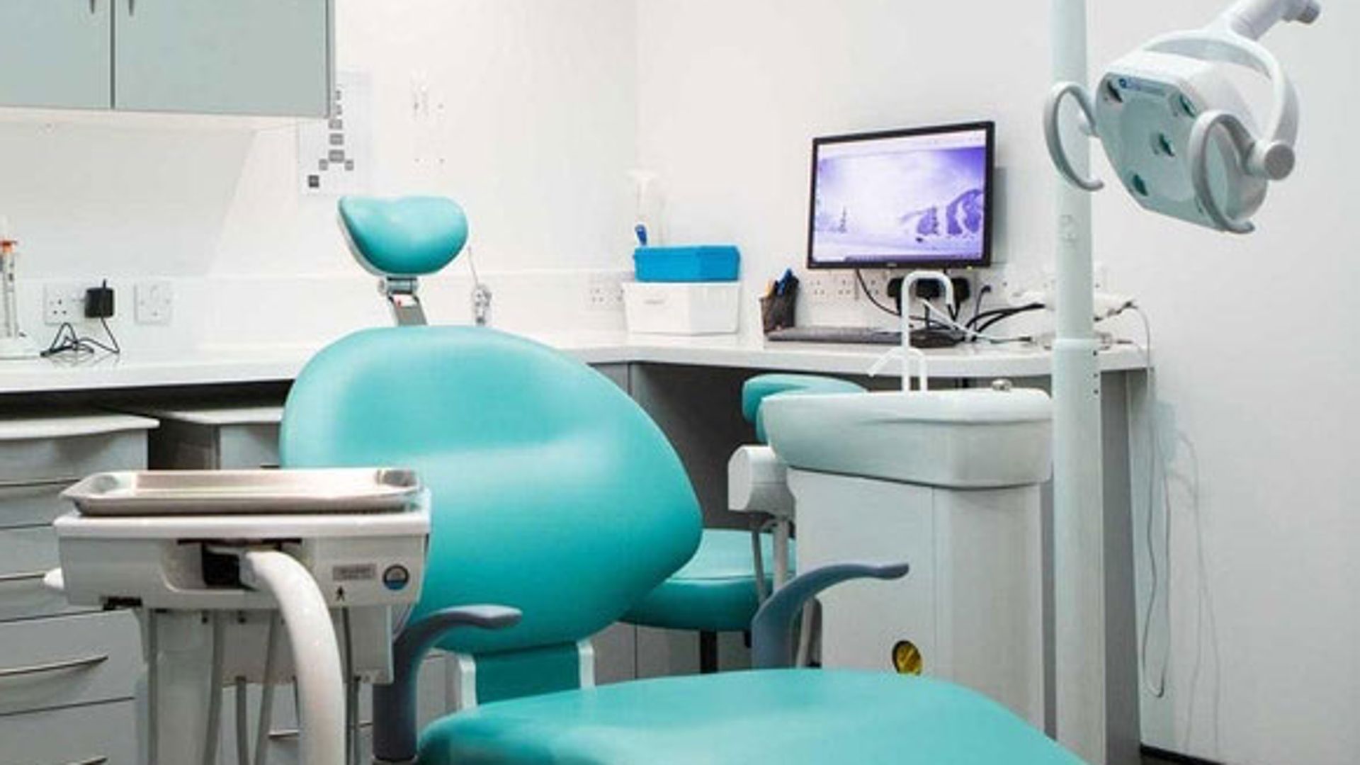 image of dental treatment room with chair and latest dental technology