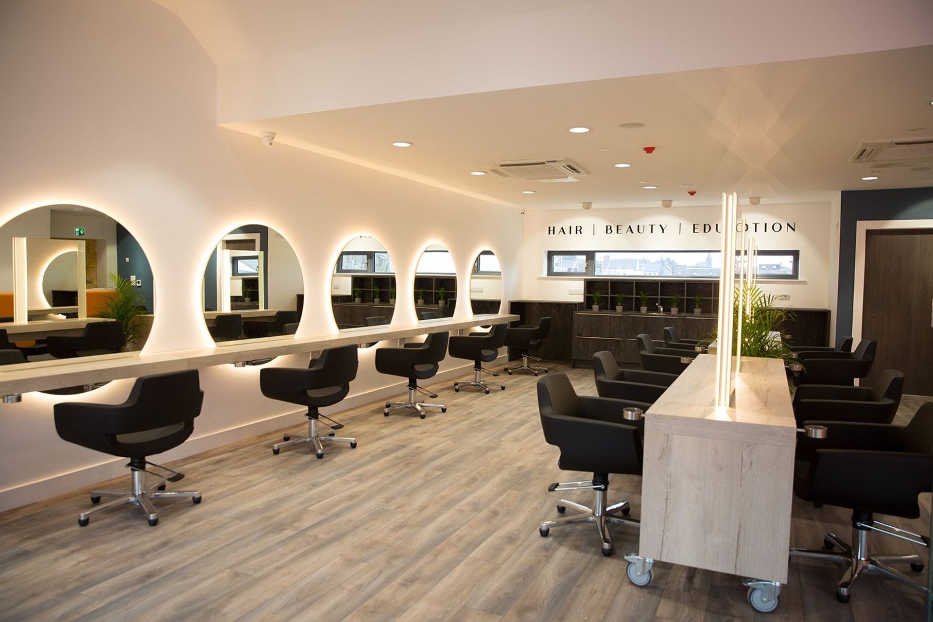 Styling stations and backlit mirrors at Salon 2