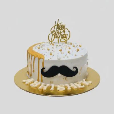 White Birthday Cake with Gold Drip & Mustache Theme