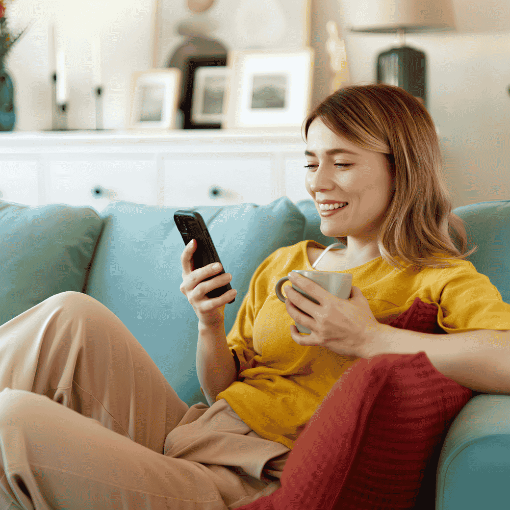 woman-smiling-on-phone