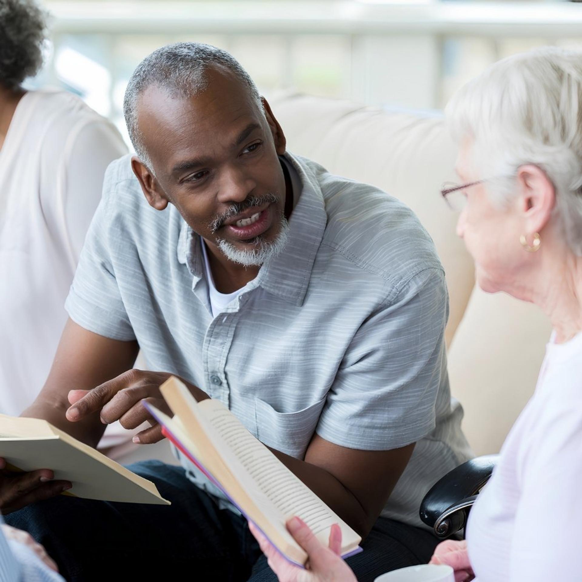 man-talking-to-woman-at-religious-community