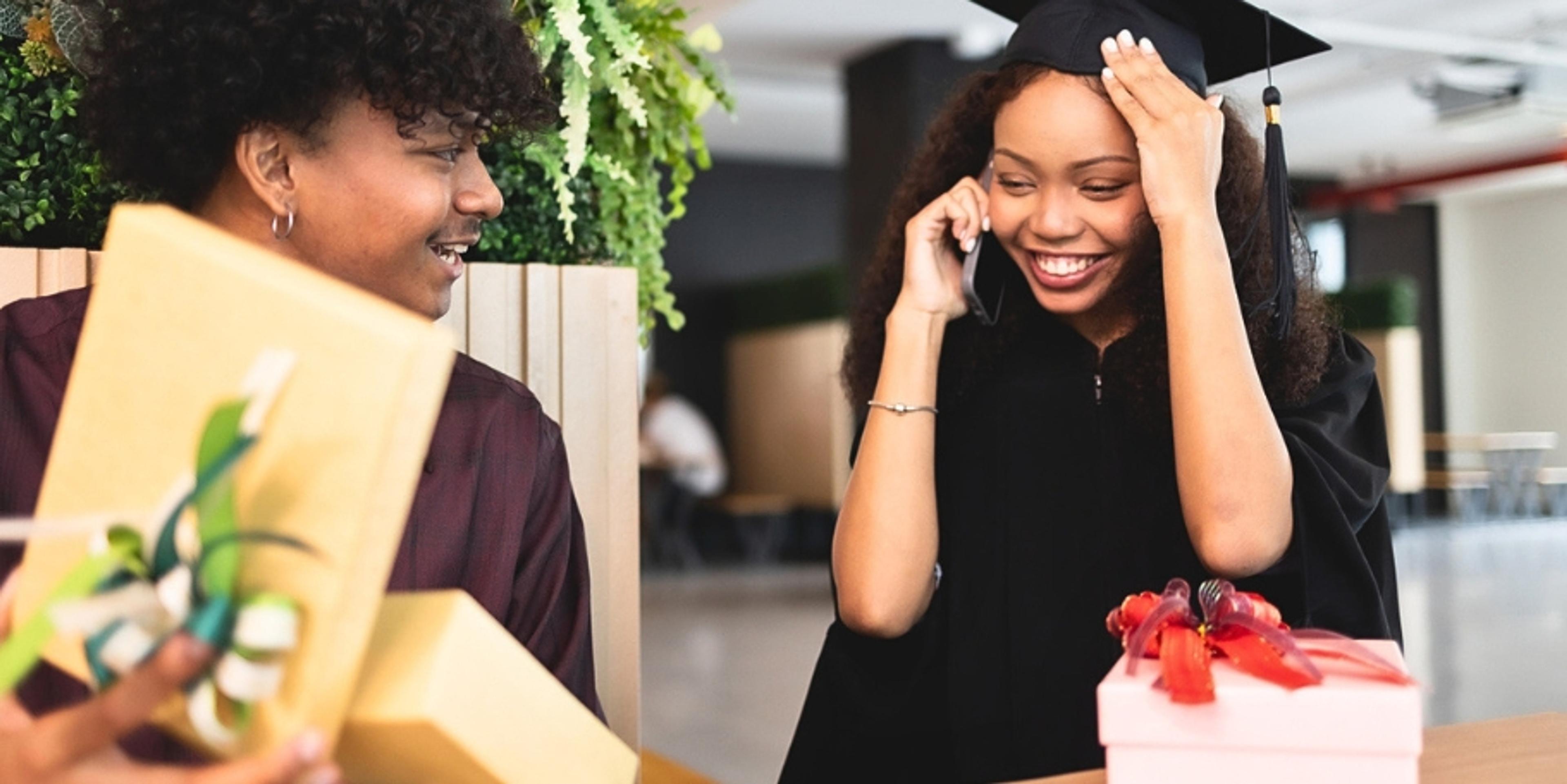 graduate receiving a gift