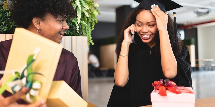 graduate receiving a gift