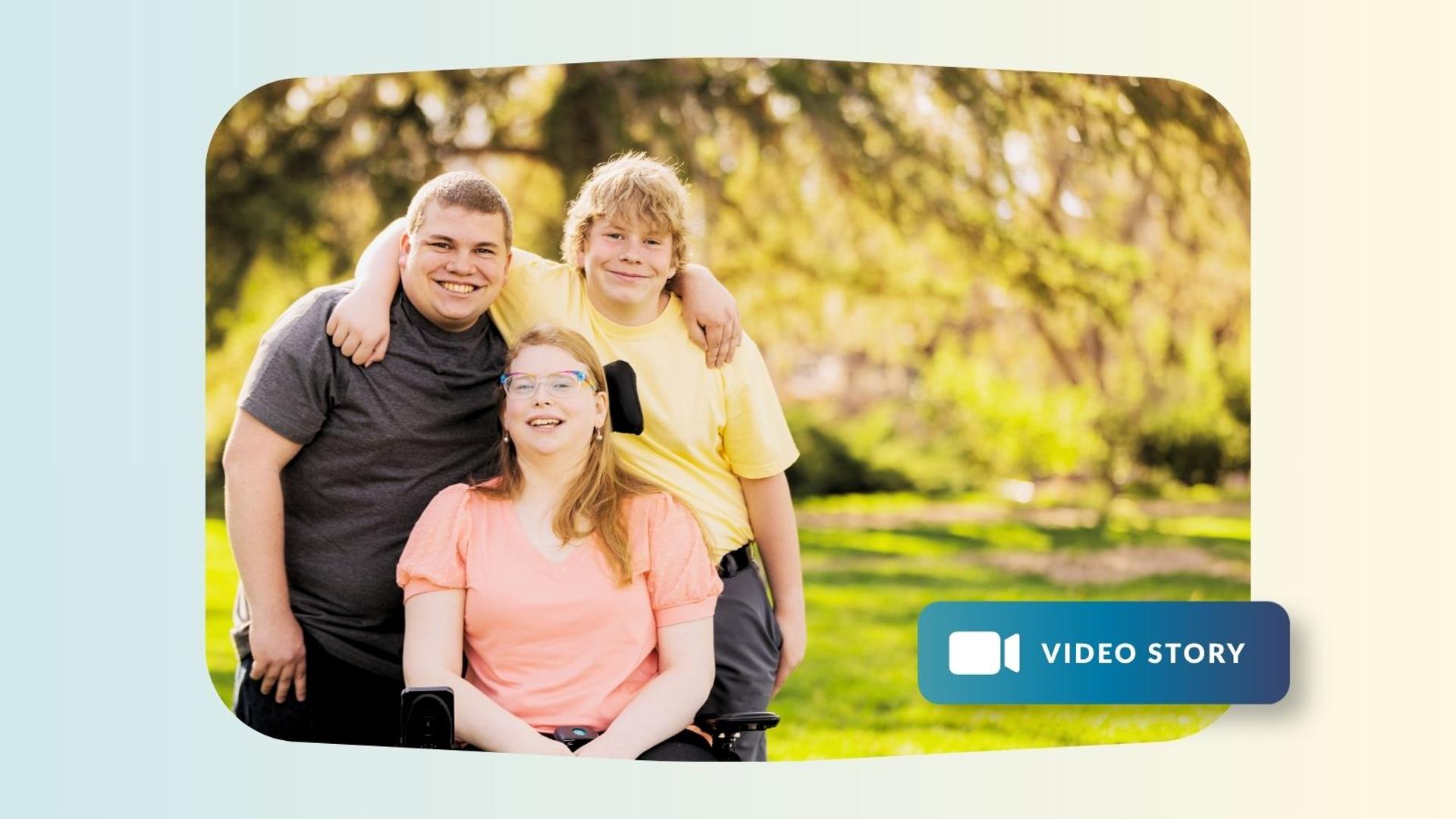 Group of special needs children share a hug and a smile in natural light.