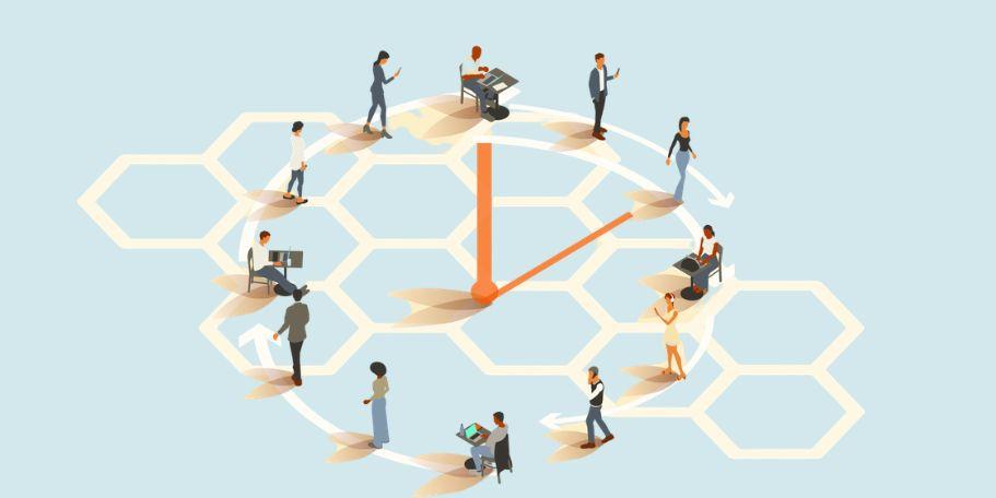 volunteers standing around clock