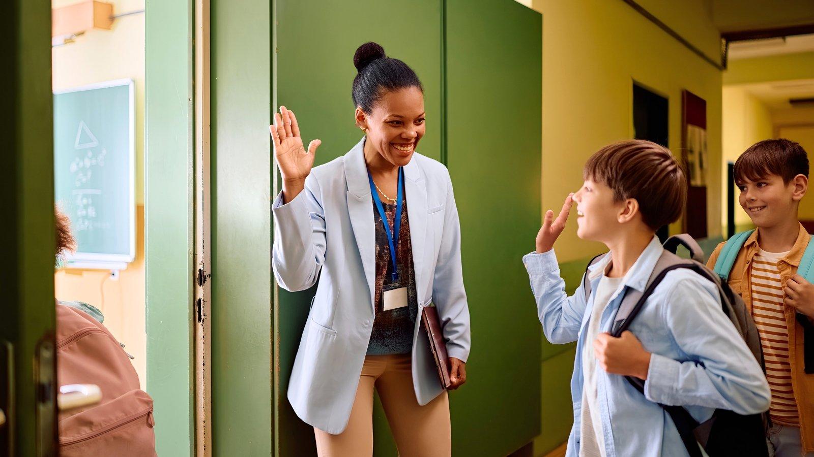 teacher-high-fiving-student