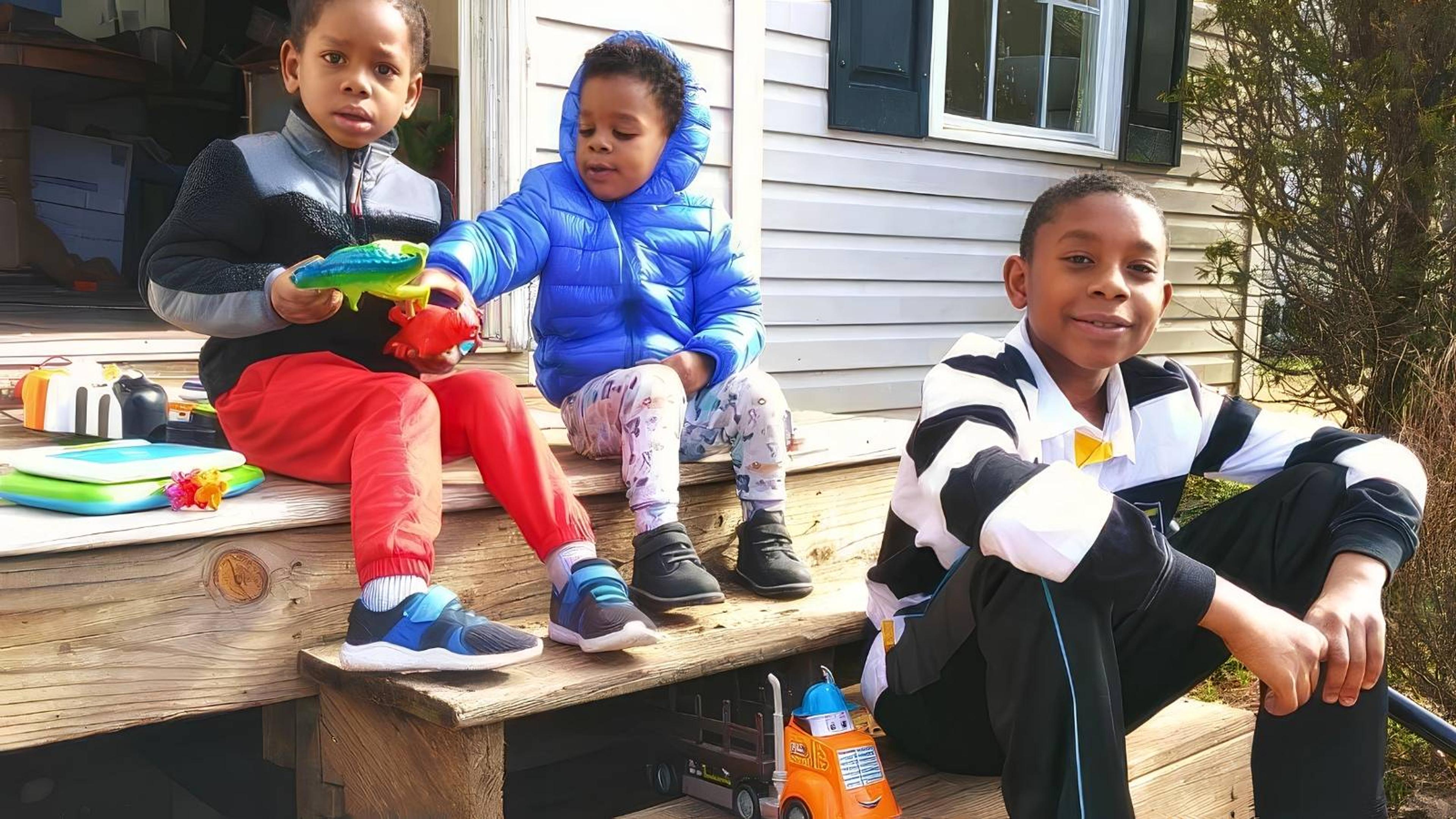 young-children-on-front-porch
