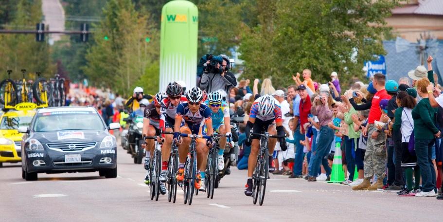 cycling race contestants and crowd