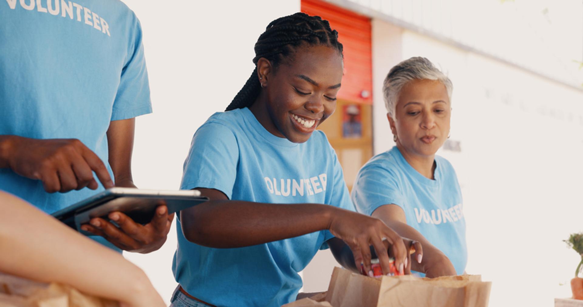 volunteers packing boxes