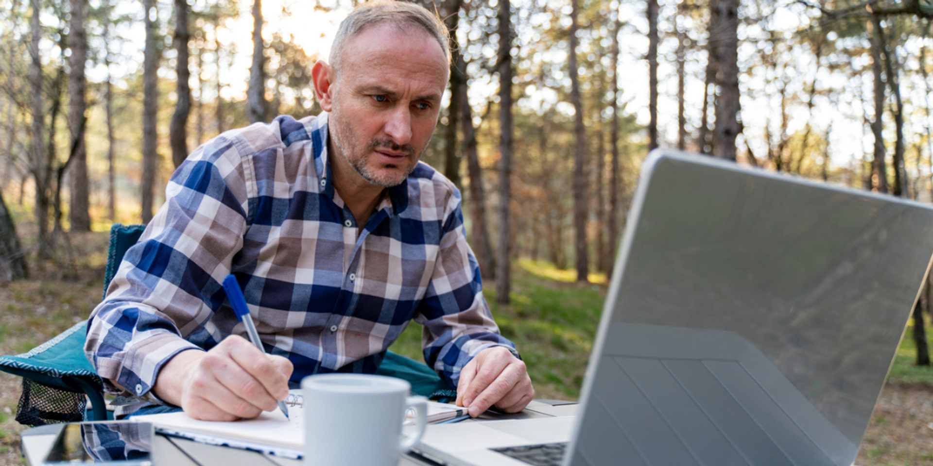 man planning summer camp
