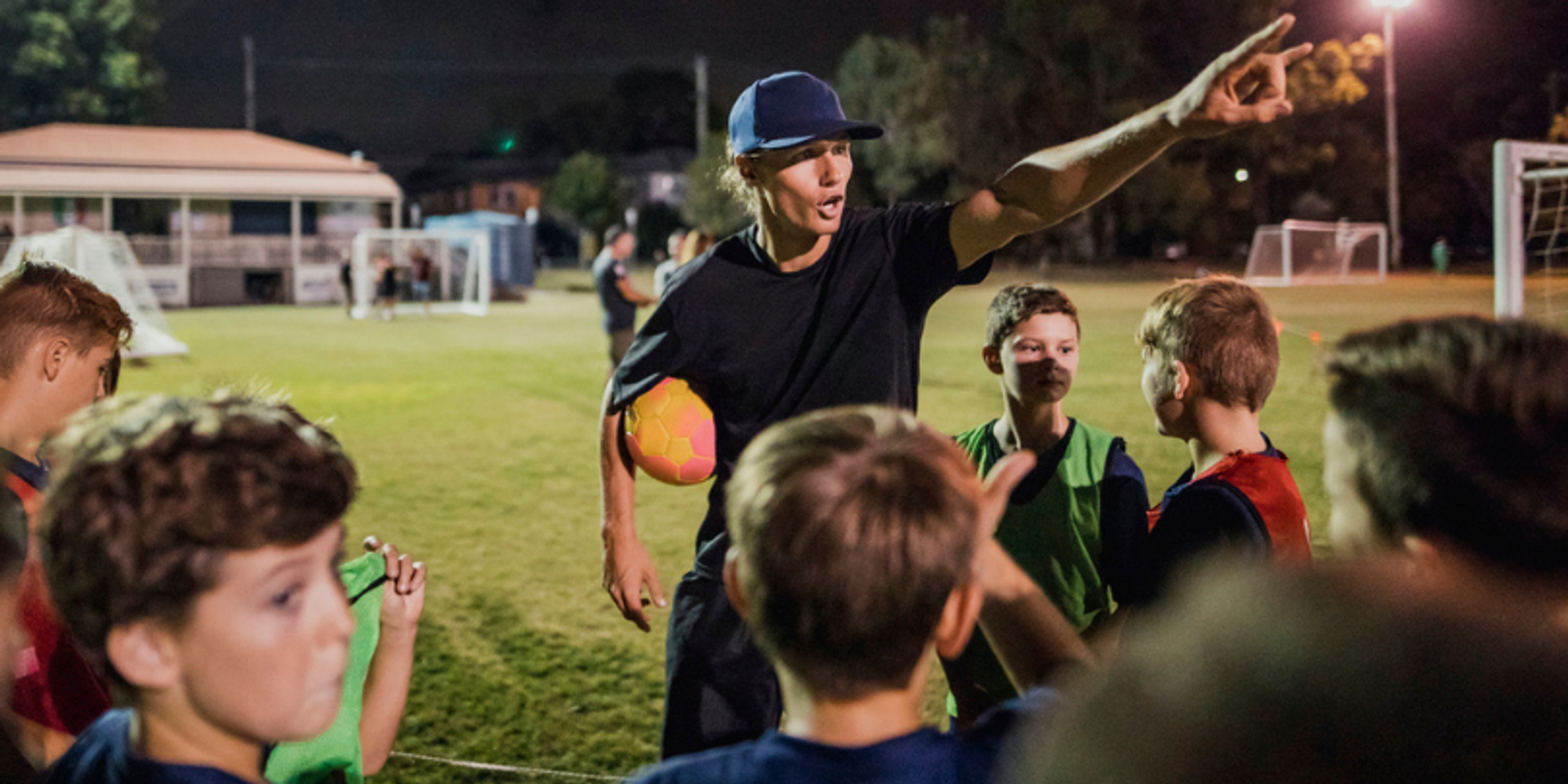 coach talking to players