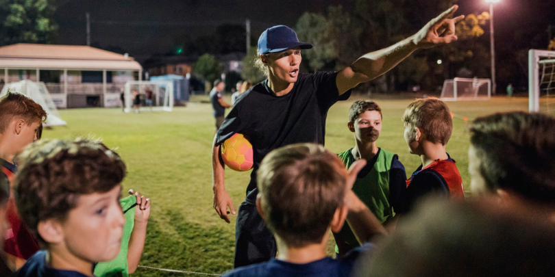 coach talking to players