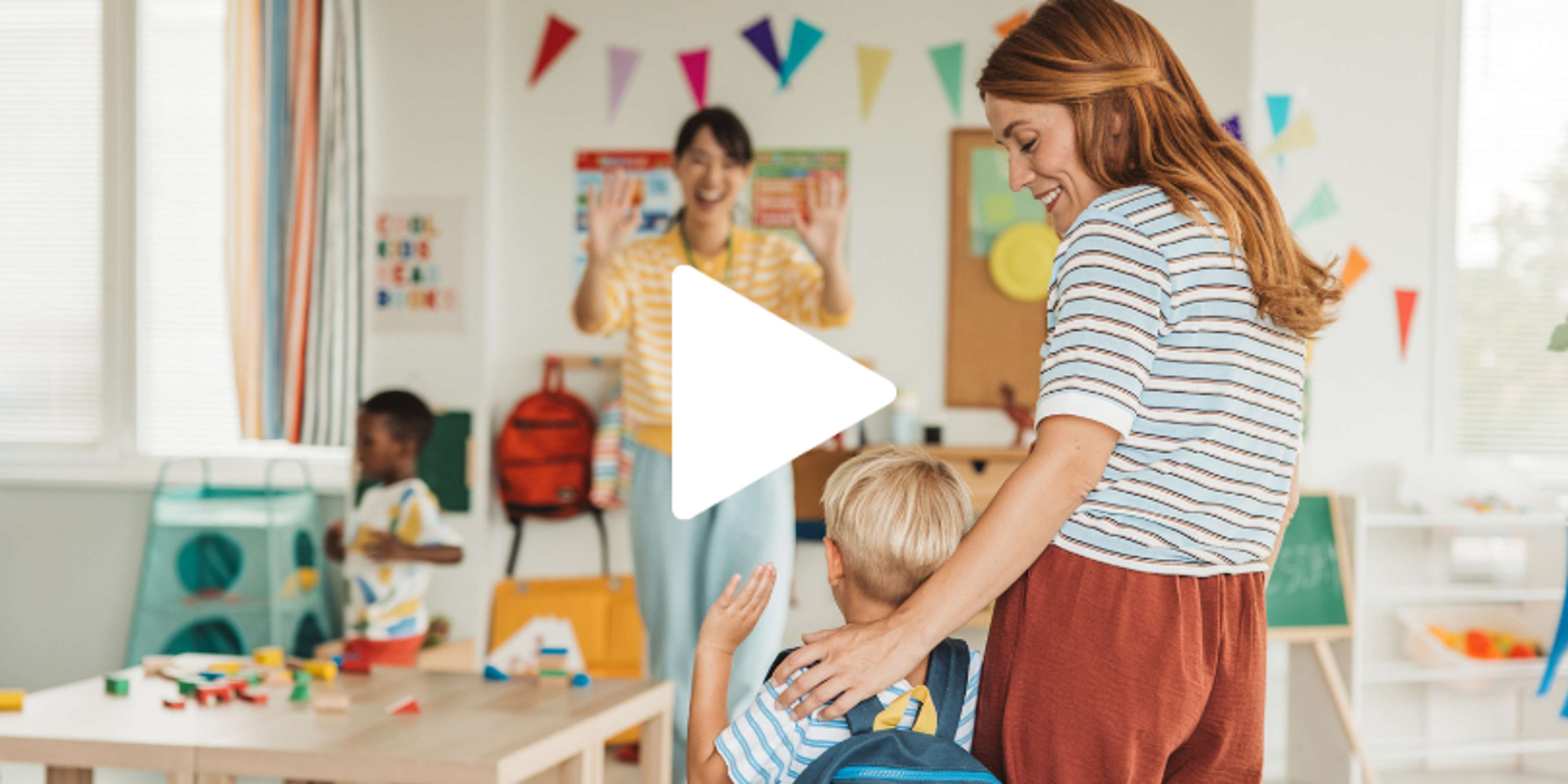 Outside of Banks Road Elementary school during pick up time with sign showing.
