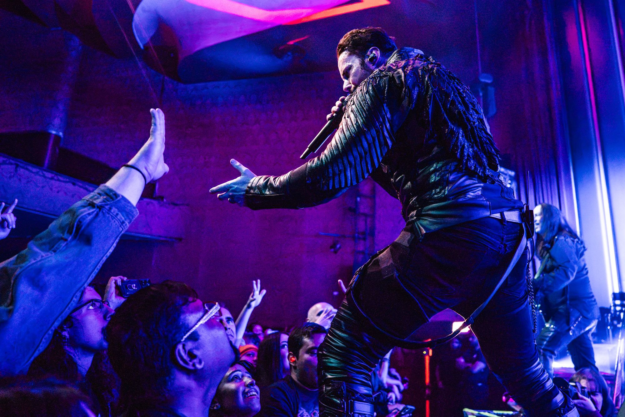 Tommy Karevik, singer of Kamelot, sings to the audience