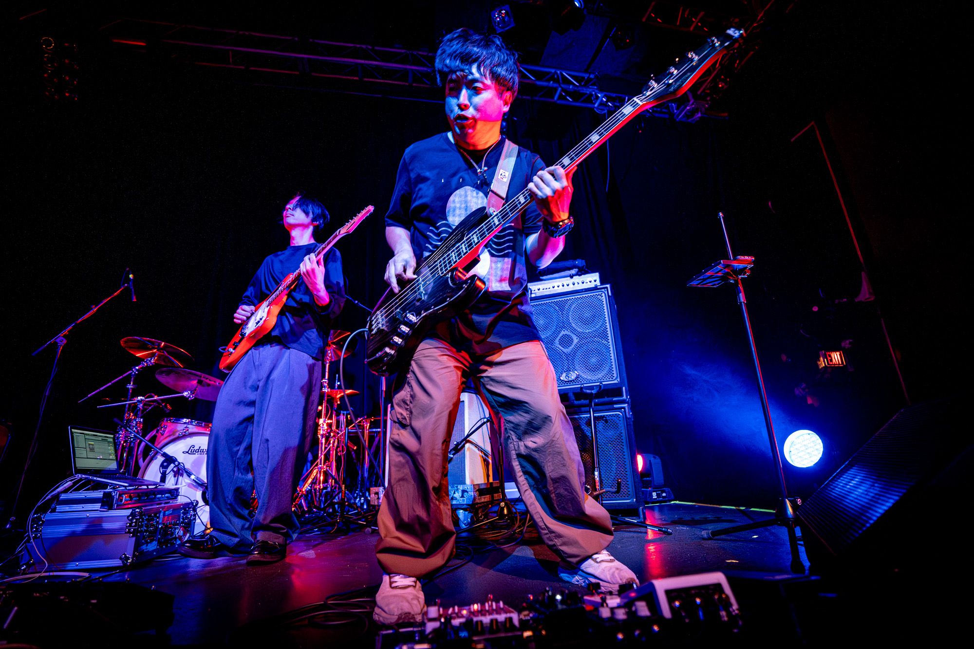 Bassist and guitarist from LITE playing at the PEARL